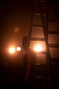 Performer composing themselves before walking on stage
